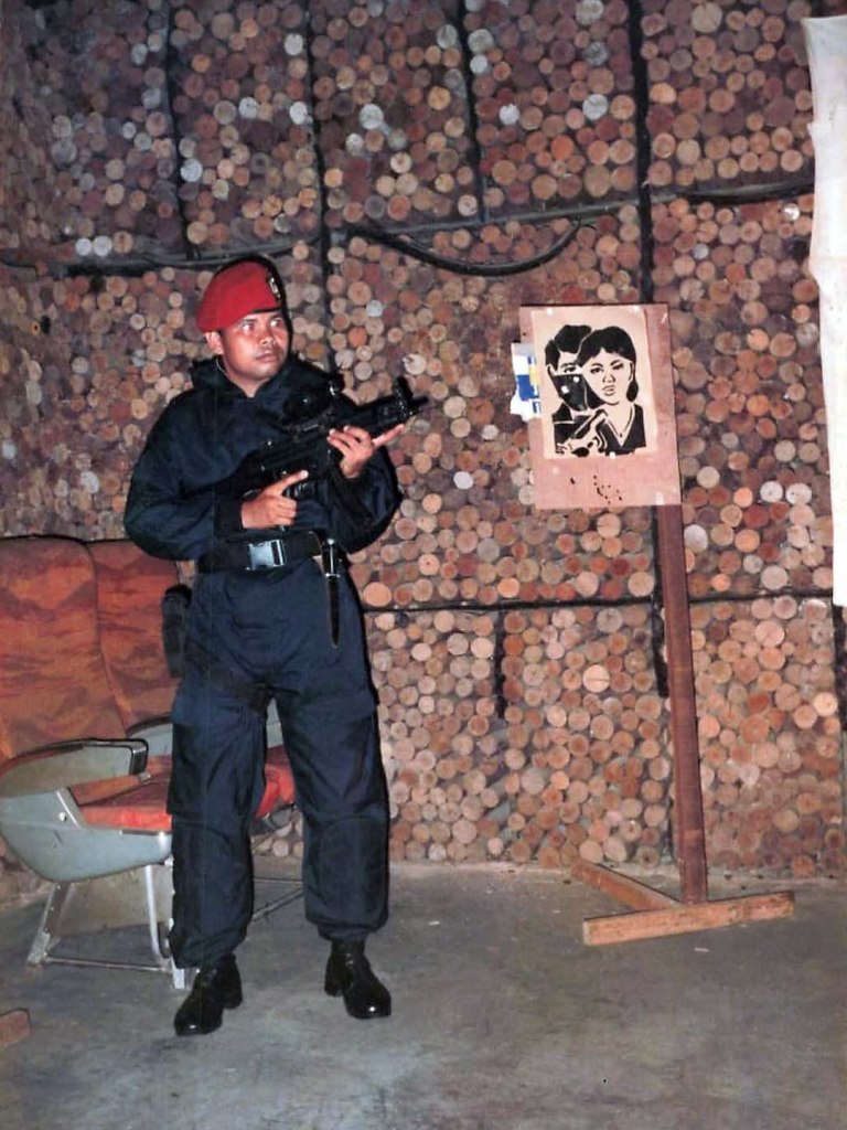 Mayor Inf (Purn) R. Silaban, SAT81 Gultor Kopassus. The prime example of early Vest, Assault Suit under NSN 8415-99-811-2668.

“[...] From a generous initial budget approved by Moerdani, they purchased some of the best counter-terrorist gear in the world. Assault rifles were the highly regarded Heckler and Koch MPSK from West Germany.

For assault suits and leather assault harnesses, they contacted Ibcol UK Limited, a subsidiary of West Germany’s Ibcol GmbH; this gear was based on designs already manufactured for the British Special Air Service.” — Ken Conboy, Kopassus: Inside Indonesia’s Special Forces.
