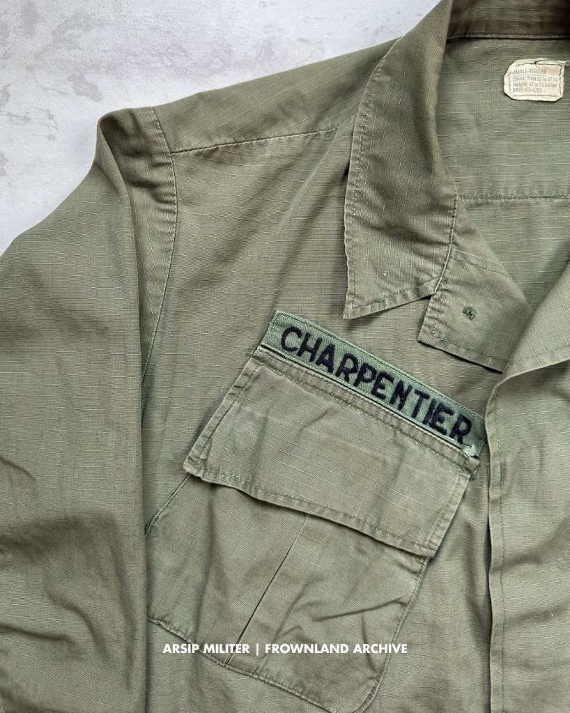 late war period jungle fatigue jacket belonged to Charpentier - 23rd Infantry “Americal” Division. Dated 1970 (DSA 100-70-C-0249). theater-made hand-sewn name tape, theater made embroidered US Army tape, with standard merrowed edge SSI (as seen in period pictures). all original.