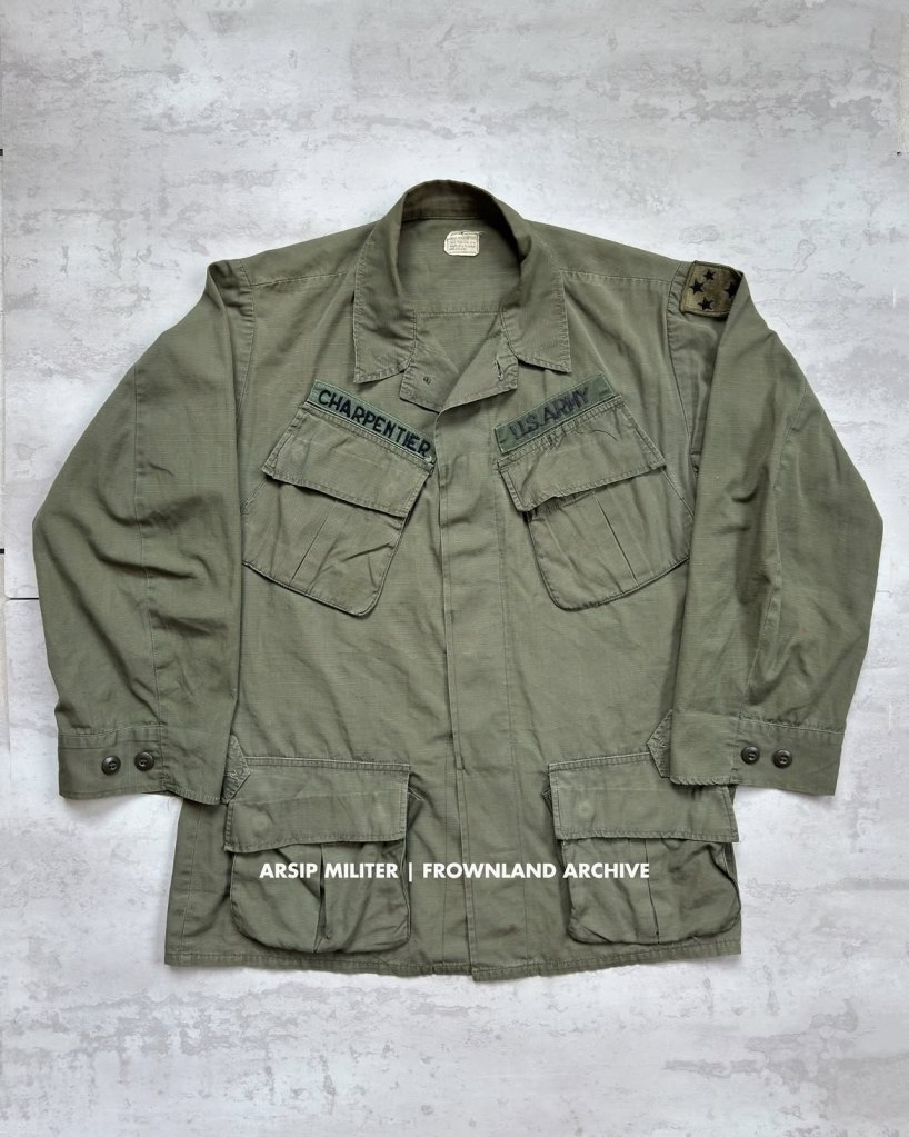 late war period jungle fatigue jacket belonged to Charpentier - 23rd Infantry “Americal” Division. Dated 1970 (DSA 100-70-C-0249). theater-made hand-sewn name tape, theater made embroidered US Army tape, with standard merrowed edge SSI (as seen in period pictures). all original.